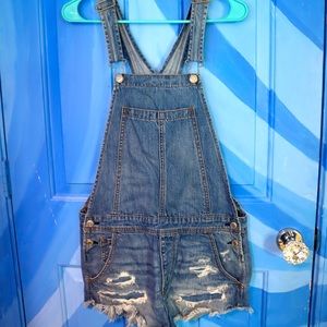 American Eagle outfitters light wash overall shorts with cute distressed detail